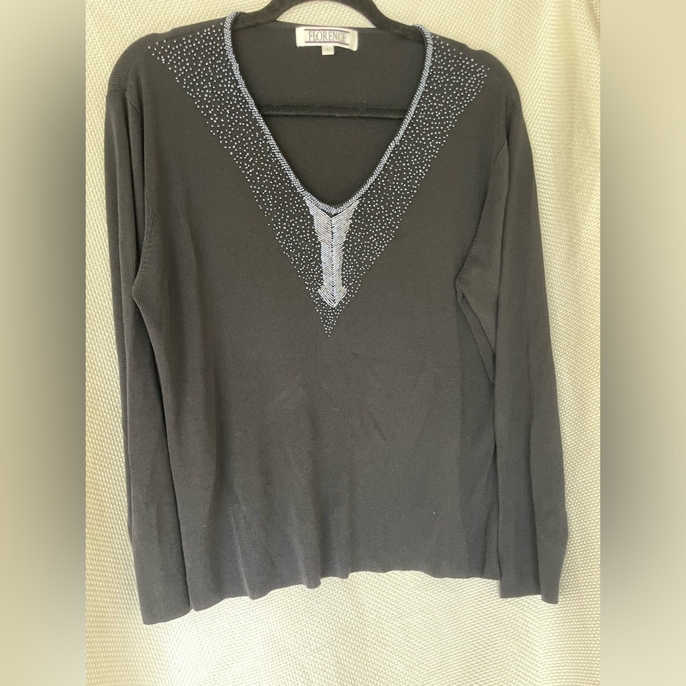 Florence long sleeve black dressy top with beaded detail at neckline size Large